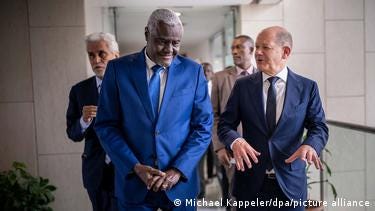 Chancellor Olaf Scholz with AU Commission President Moussa Faki Mahamat Chancellor Olaf Scholz with AU Commission President Moussa Faki Mahamat
