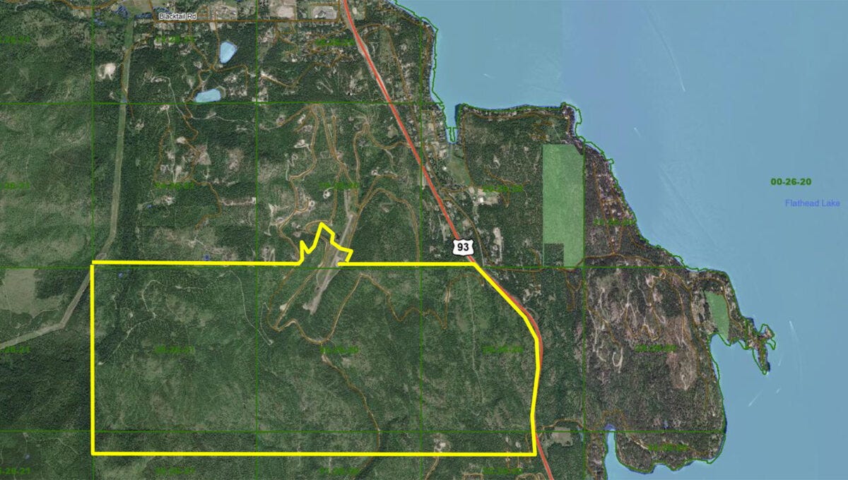 A map of land with a yellow line

Description automatically generated