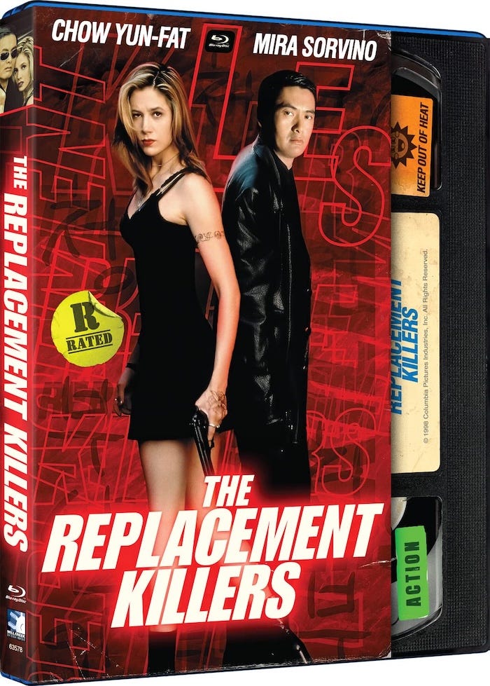 Mill Creek’s Blu-ray release of The Replacement Killers featuring VHS-style slipcover artwork with Chow Yun-Fat and Mira Sorvino standing in front of a red background. Mill Creek’s Blu-ray release of The Replacement Killers featuring VHS-style slipcover artwork with Chow Yun-Fat and Mira Sorvino standing in front of a red background.