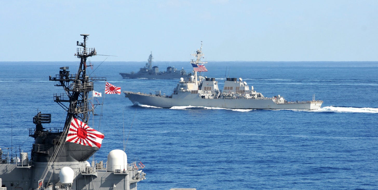 File:US Navy 101210-N-7191M-031 U.S. Navy and Japan Maritime Self-Defense  Force (JMSDF) ships underway in formation as part of a photo exercise on  the f.jpg - Wikimedia Commons
