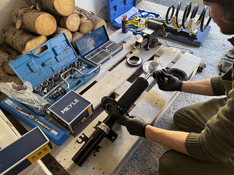 removing a broken suspension strut vw t5 replacement video