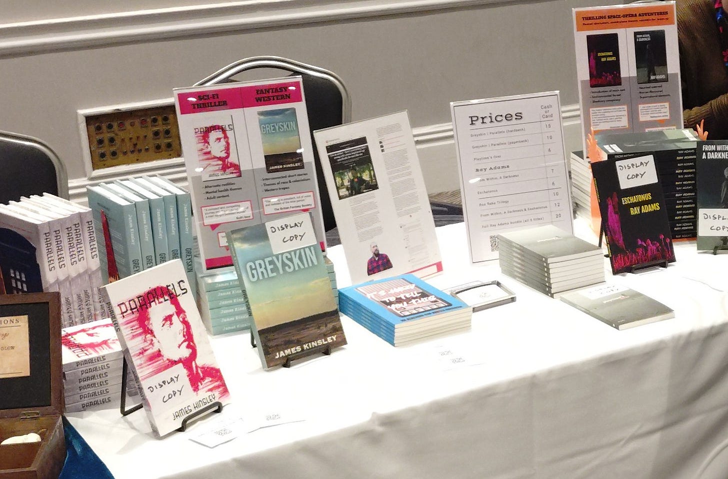 An array of my books displayed on a table An array of my books displayed on a table