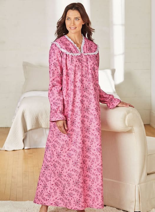 woman wearing a floor-length pink flannel nightgown