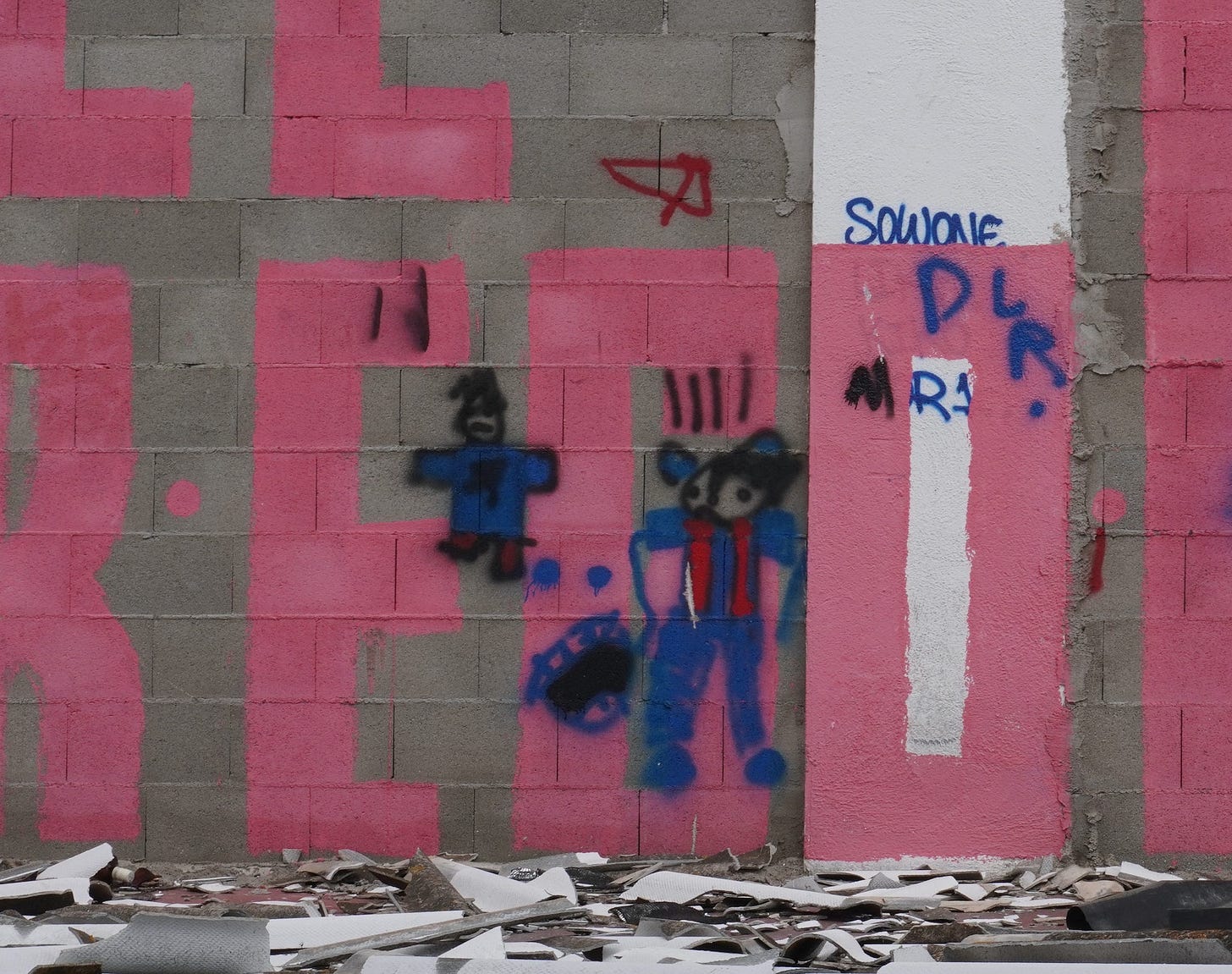 A poorly spray painted mouse and guy