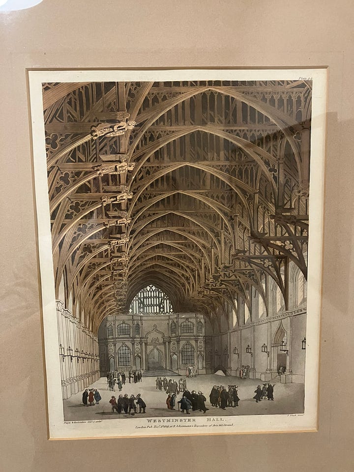 Drawing of Westminster Hall shown in the home of Winston Churchill. Newspaper and greeting card shots related to Prime Minister Boris Johnson.