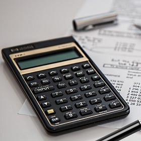 In sede di accertamento con adesione vanno riconosciuti i costi forfettari, a seguito della ricostruzione di maggiori ricavi