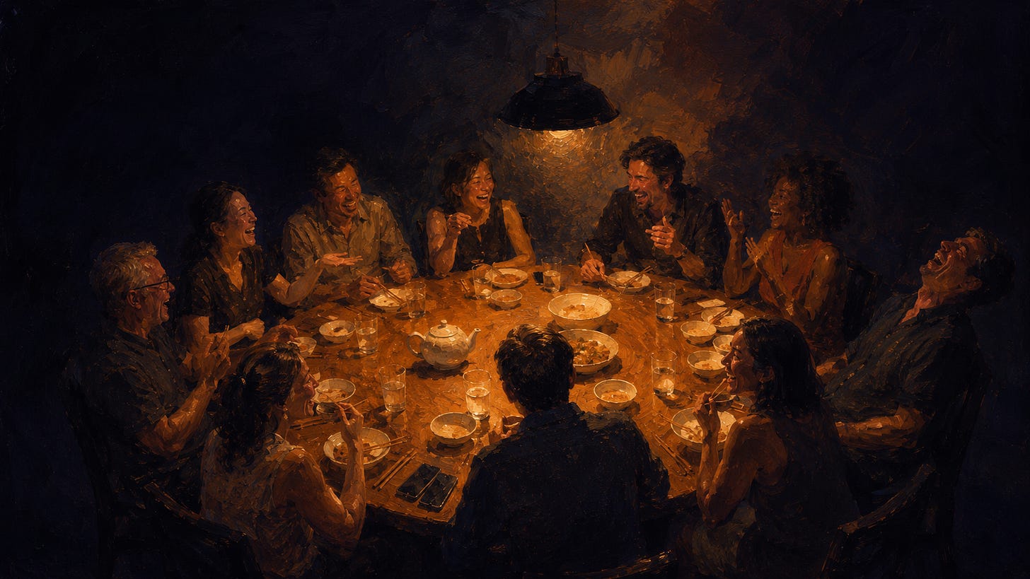 Laughing around a dinner table with friends