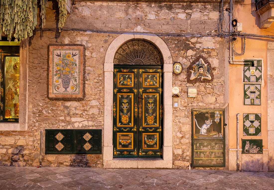 An old doorway in Taormina, Sicily. An old doorway in Taormina, Sicily.
