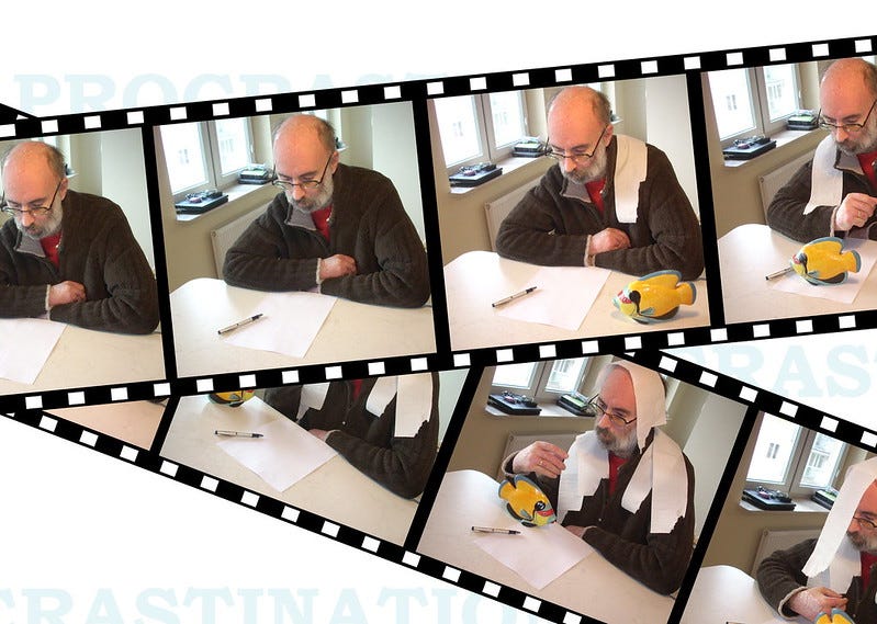 man procrastinating by doing silly things man procrastinating by doing silly things