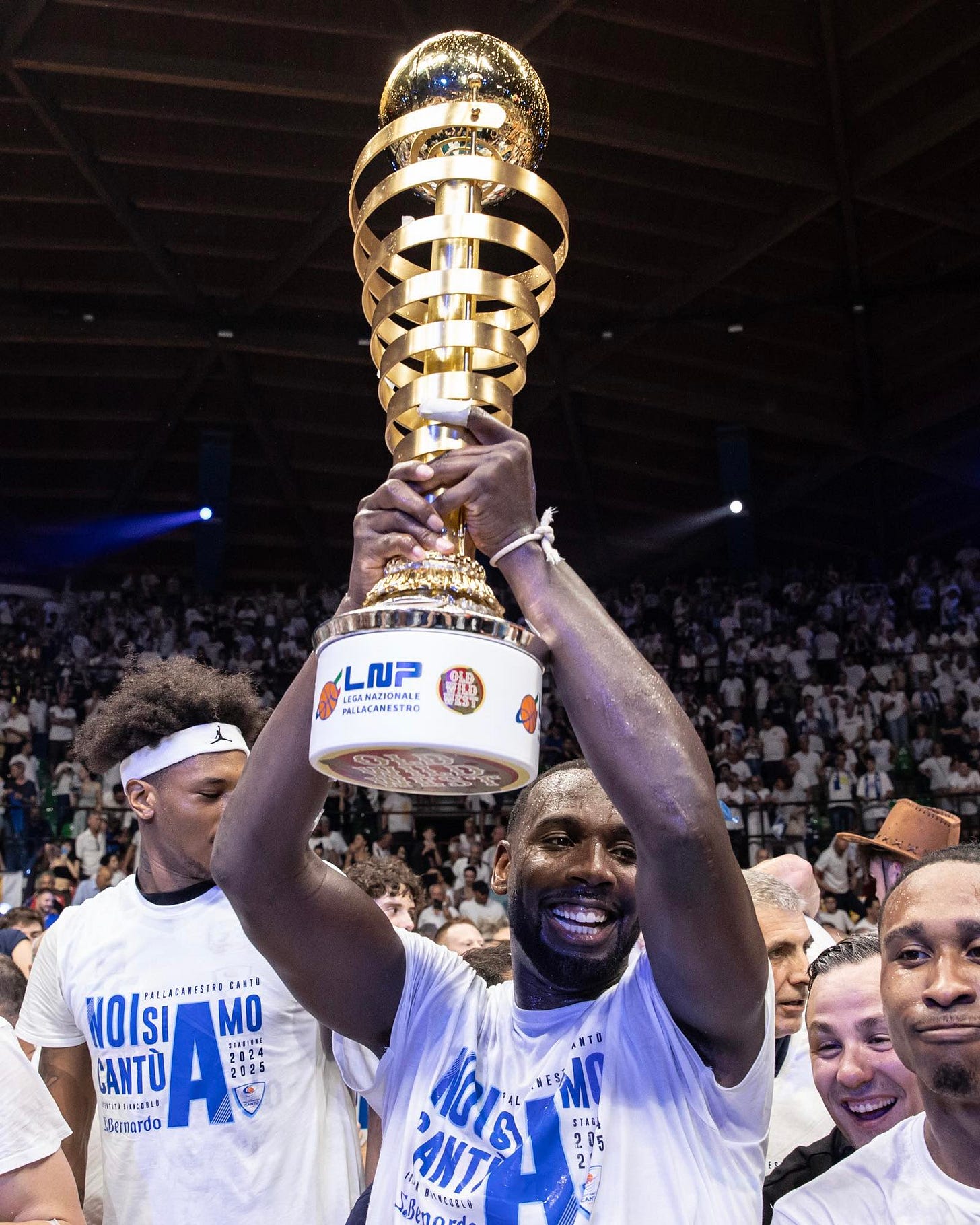 May be an image of 3 people, people playing basketball, basketball jersey, crowd and text