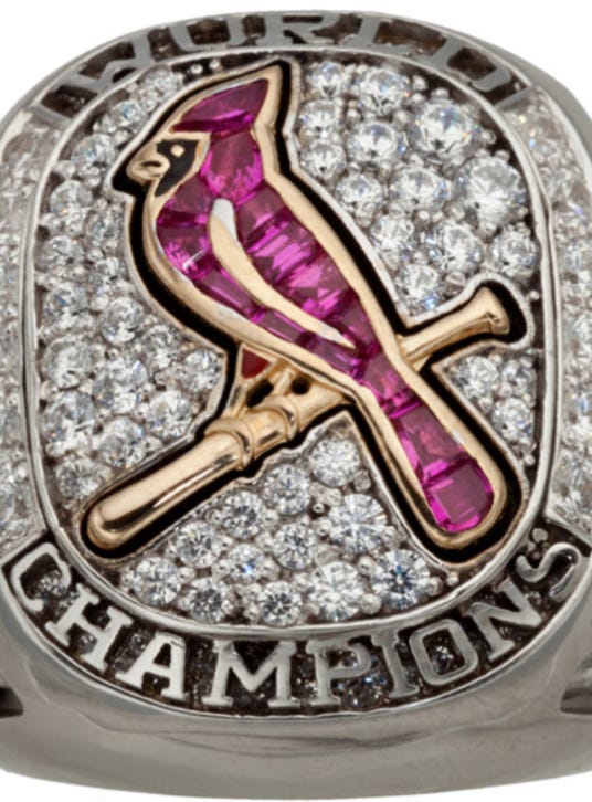 Images of the St. Louis cardinal and Rally Squirrel on the 2011 World Series Ring