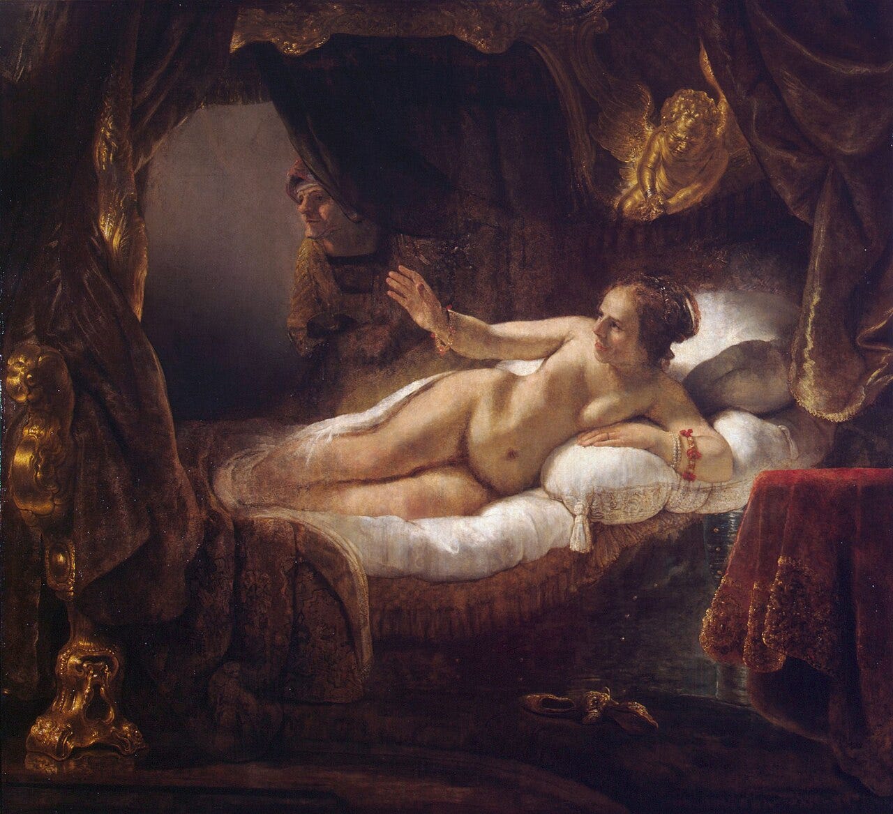 Reclining woman turning towards a light Reclining woman turning towards a light