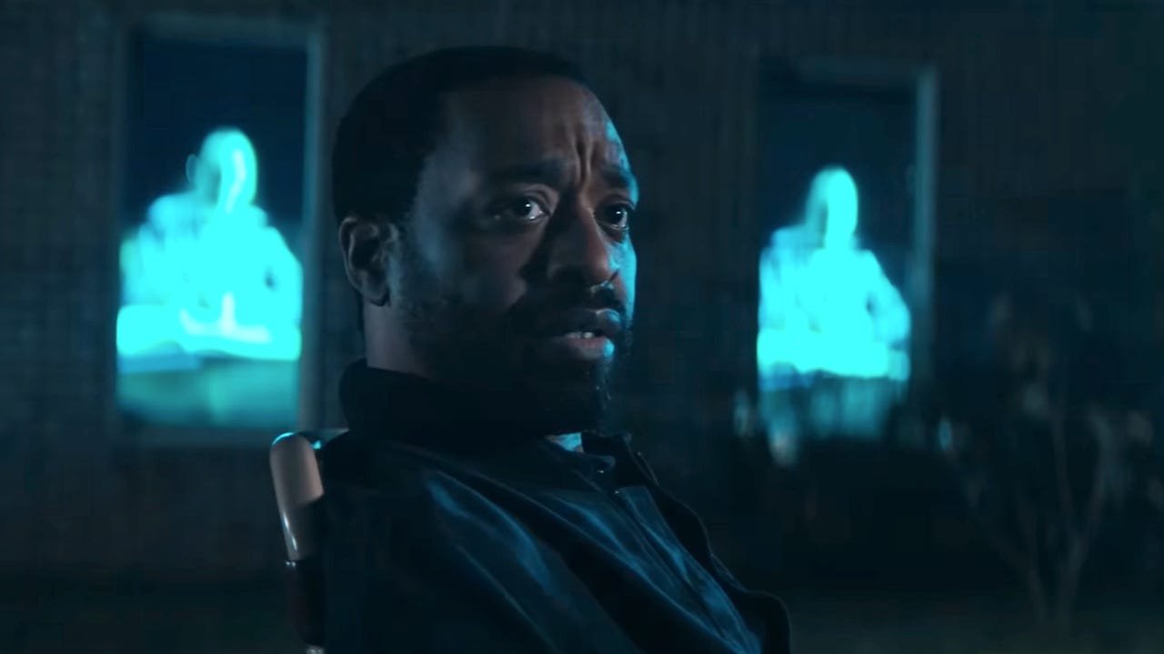 Chiwetel Ejiofor looking over while outside with Karen Gillan in The Life Of Chuck Act 3