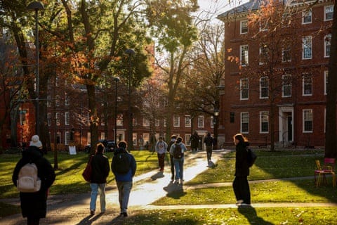 students walk on a university campus