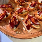 red wine poached pear and blue cheese crostinis