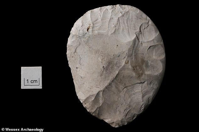 Archaeologists found an 'exquisite' circular stone knife (pictured) in line with the poles, which could have been buried as a symbolic representation of the disc of the sun