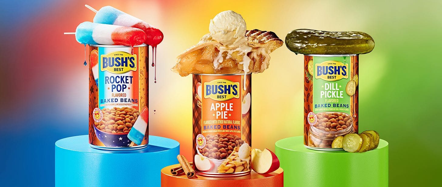 Three cans of Bush's Beans, featuring Rocket Pop, Apple Pie, and Dill Pickle flavorings Three cans of Bush's Beans, featuring Rocket Pop, Apple Pie, and Dill Pickle flavorings