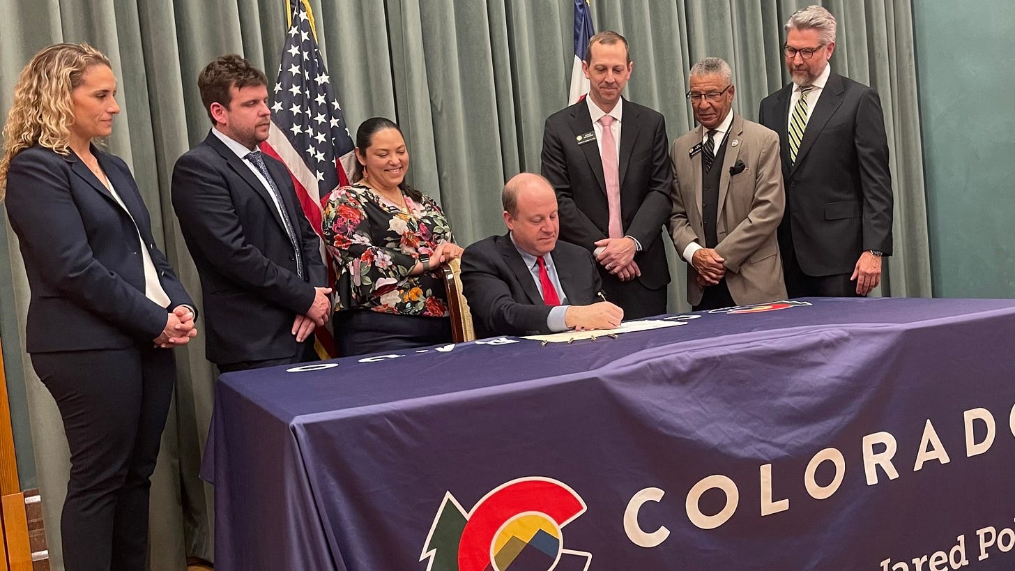 Gov. Jared Polis signs bills to spur new housing in Colorado