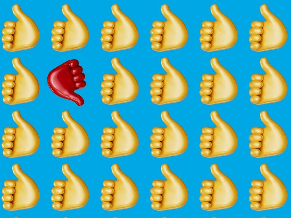 a blue background with a bunch of cookies and a red object a blue background with a bunch of cookies and a red object