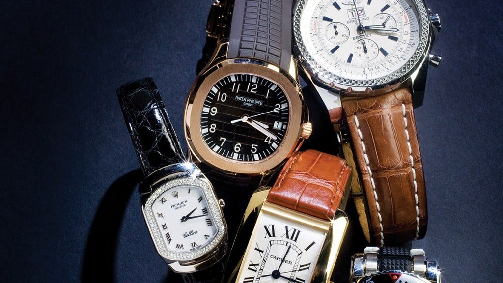 Patek Philippe's rose-gold Aquanaut timepiece, classic gold Cartier tank, a Breitling "Bentley" automatic chronograph, Rolex Cellini