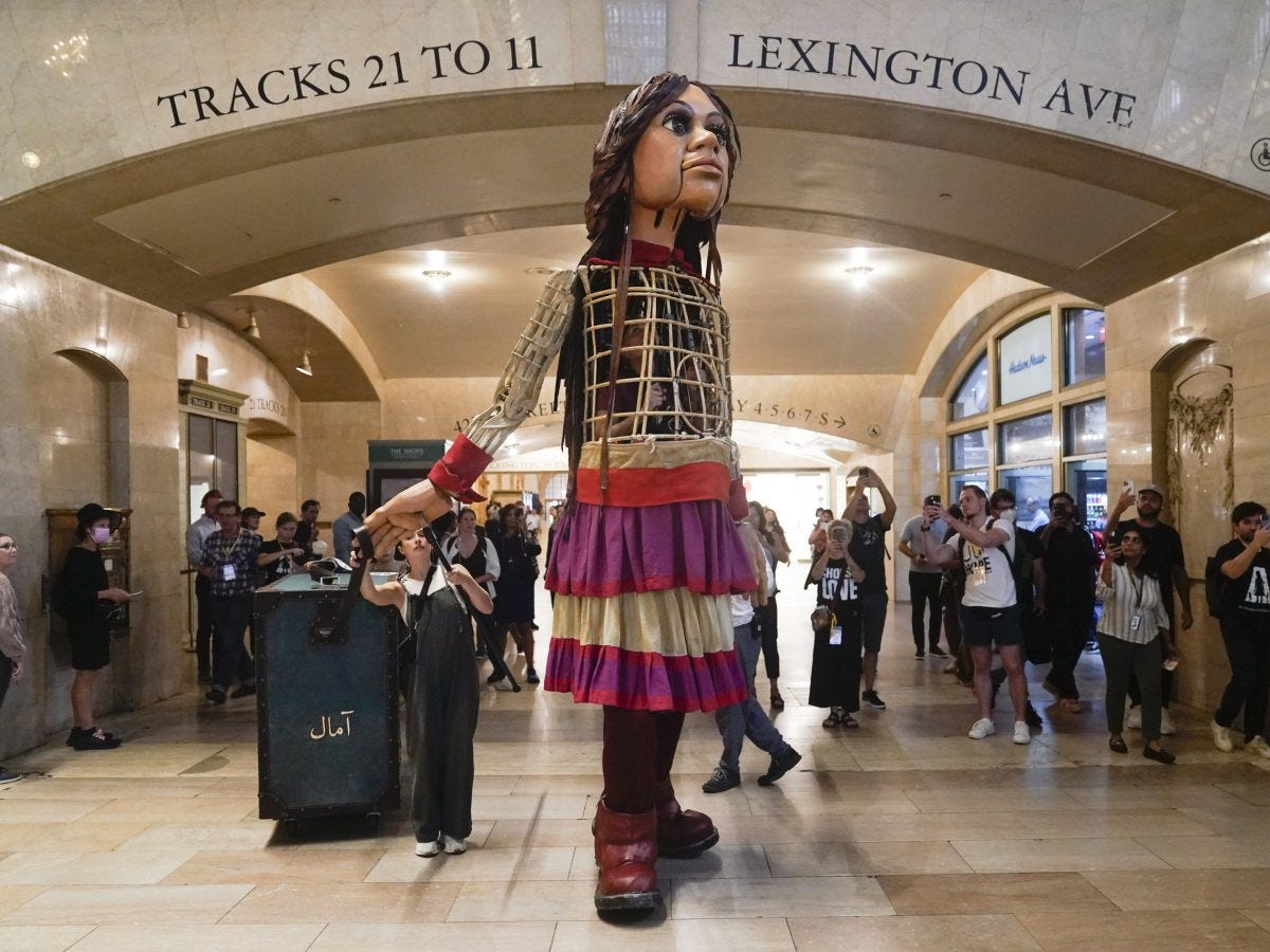 Little Amal, a 12-foot puppet of a Syrian refugee, will travel the US