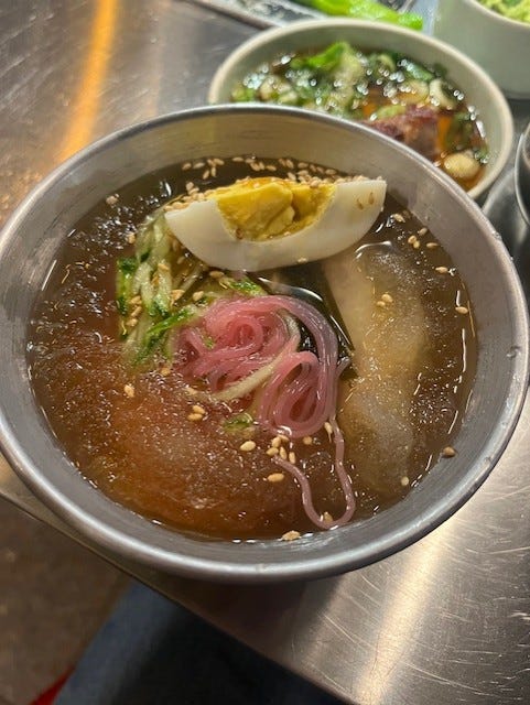 japchae, cold glass noodle salad in a korean bbq restaurant