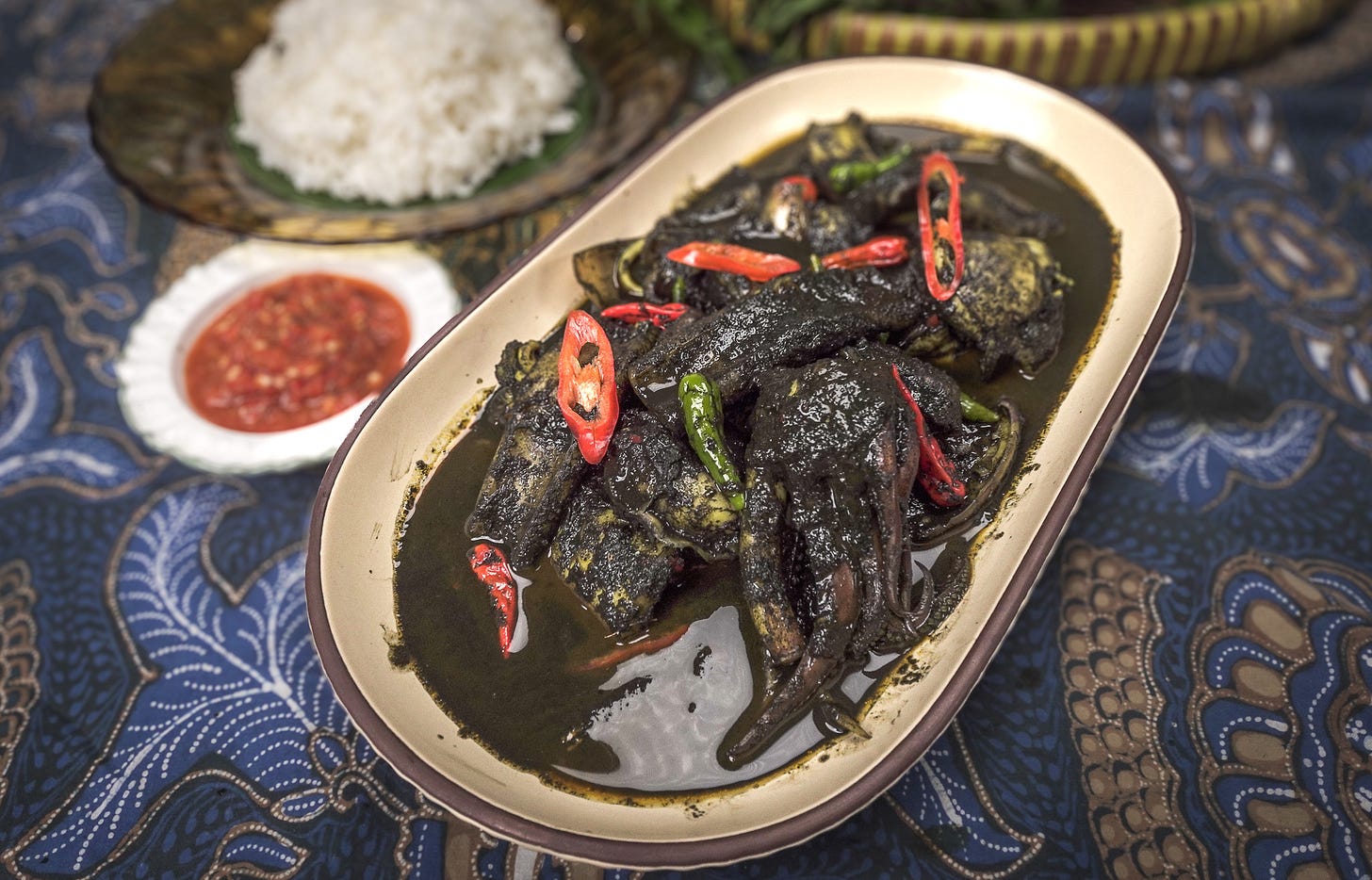 sotong in black sauce with red chilli