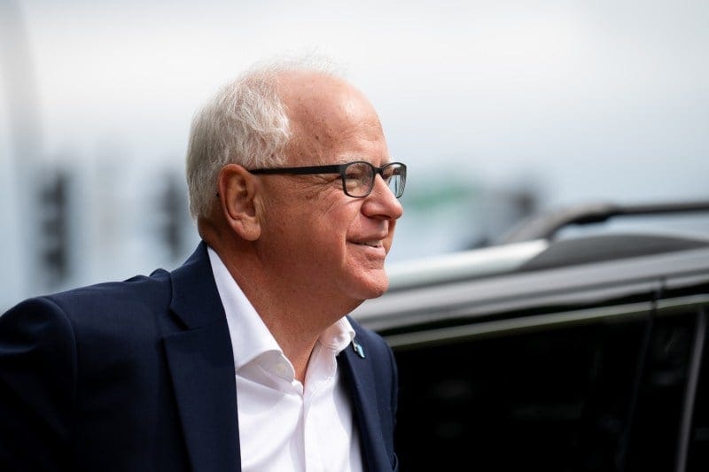 Minnesota Gov. Tim Walz arrives to speak at a press conference regarding new gun legislation at City Hall in Bloomington, Minn. Minnesota Gov. Tim Walz arrives to speak at a press conference regarding new gun legislation at City Hall in Bloomington, Minn.