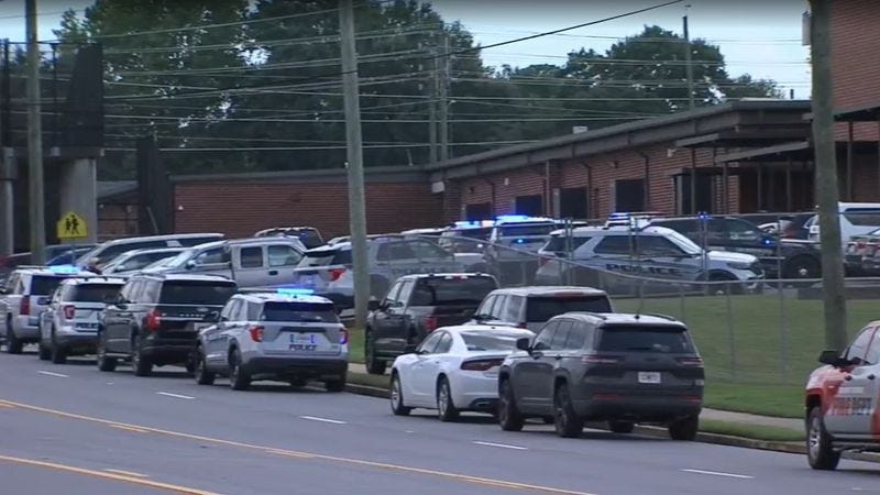 Student injured, suspect in custody after shooting at Warner Robins High  School