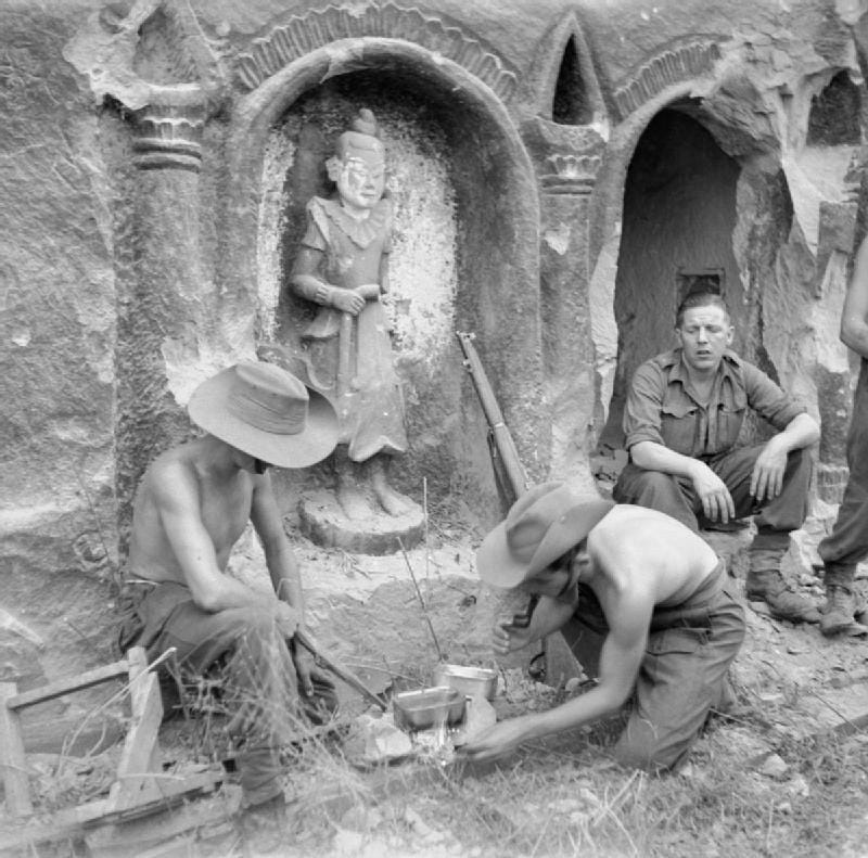 British troops preparing food near a Buddhist temple during the intense Battle of Ramree Island, January 1945. British troops preparing food near a Buddhist temple during the intense Battle of Ramree Island, January 1945.