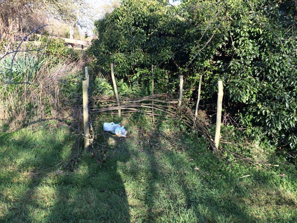 A rustic and homemade compost heap