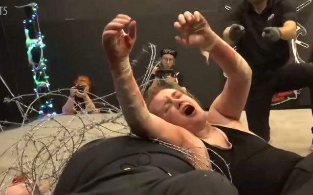 [Screenshot: Campbell in barbed wire]