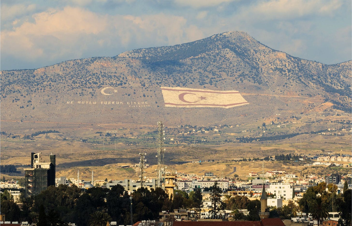 Turkish and TRNC flag on mountains overlooking Nicosia