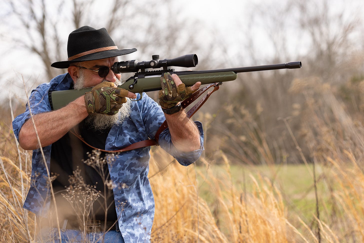 May be an image of skeet shooting and grass