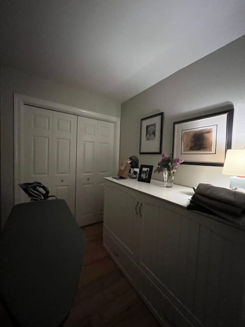 photos of the top of a cabinet with flowers and a lamp