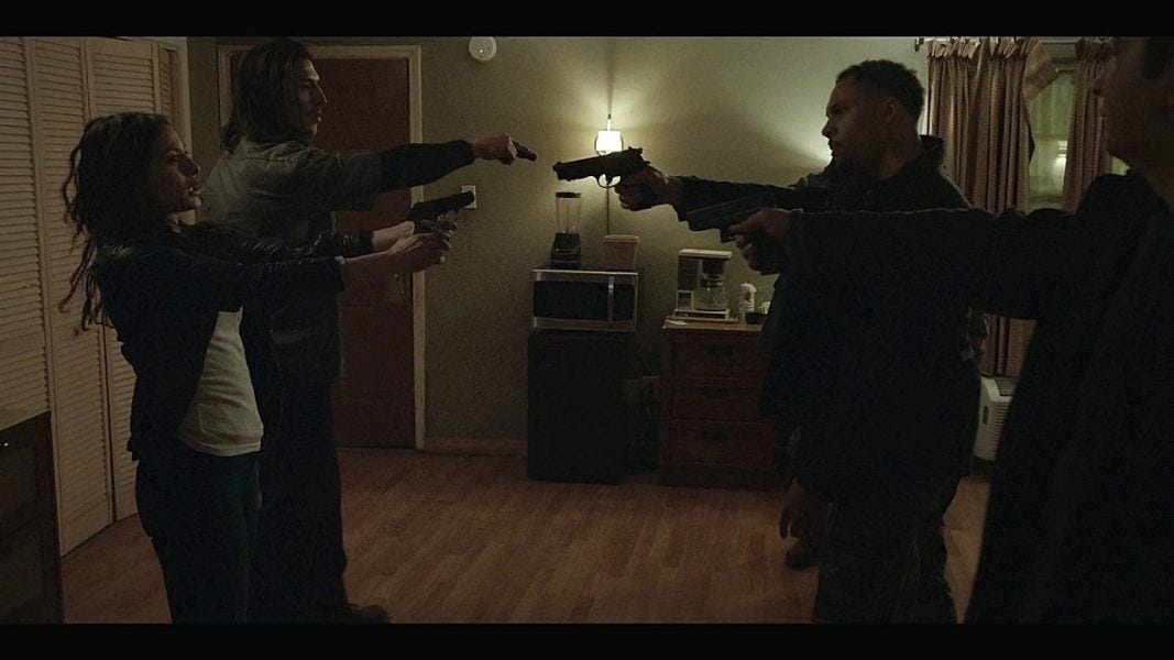 Walker Cassie pulling gun on set 4.04. Walker Cassie pulling gun on set 4.04.