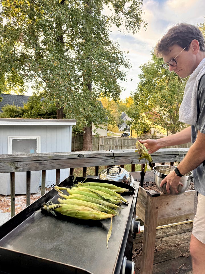 man cooking corn on the grill and baking in the kitchen