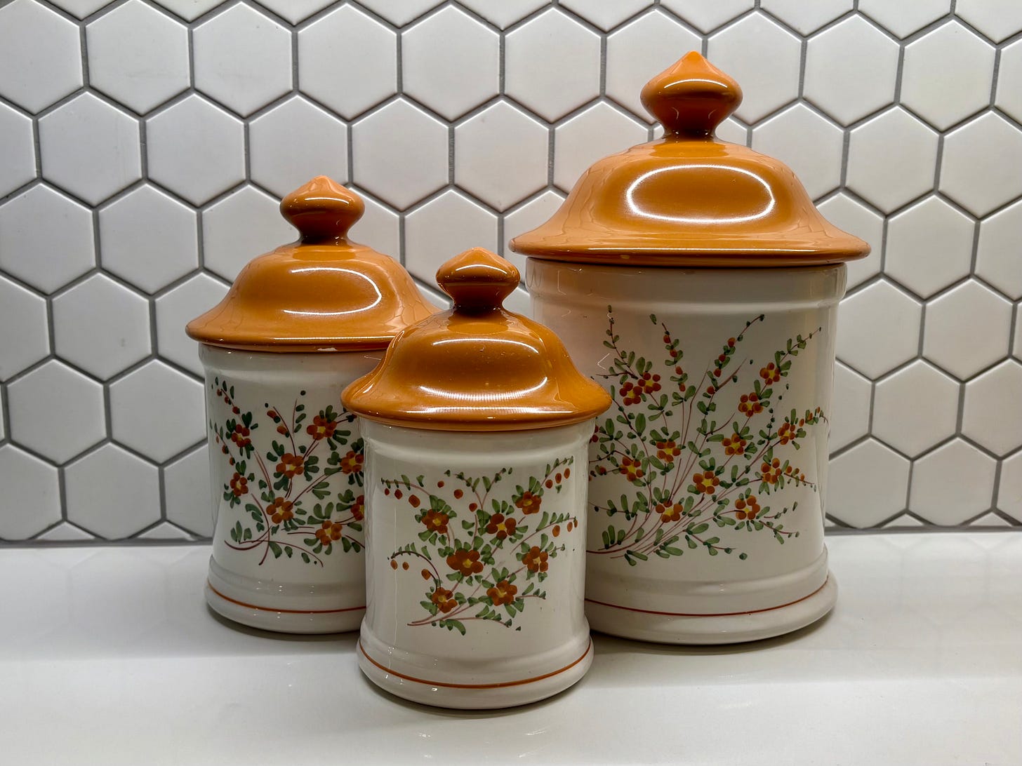 three retro style cookie jars