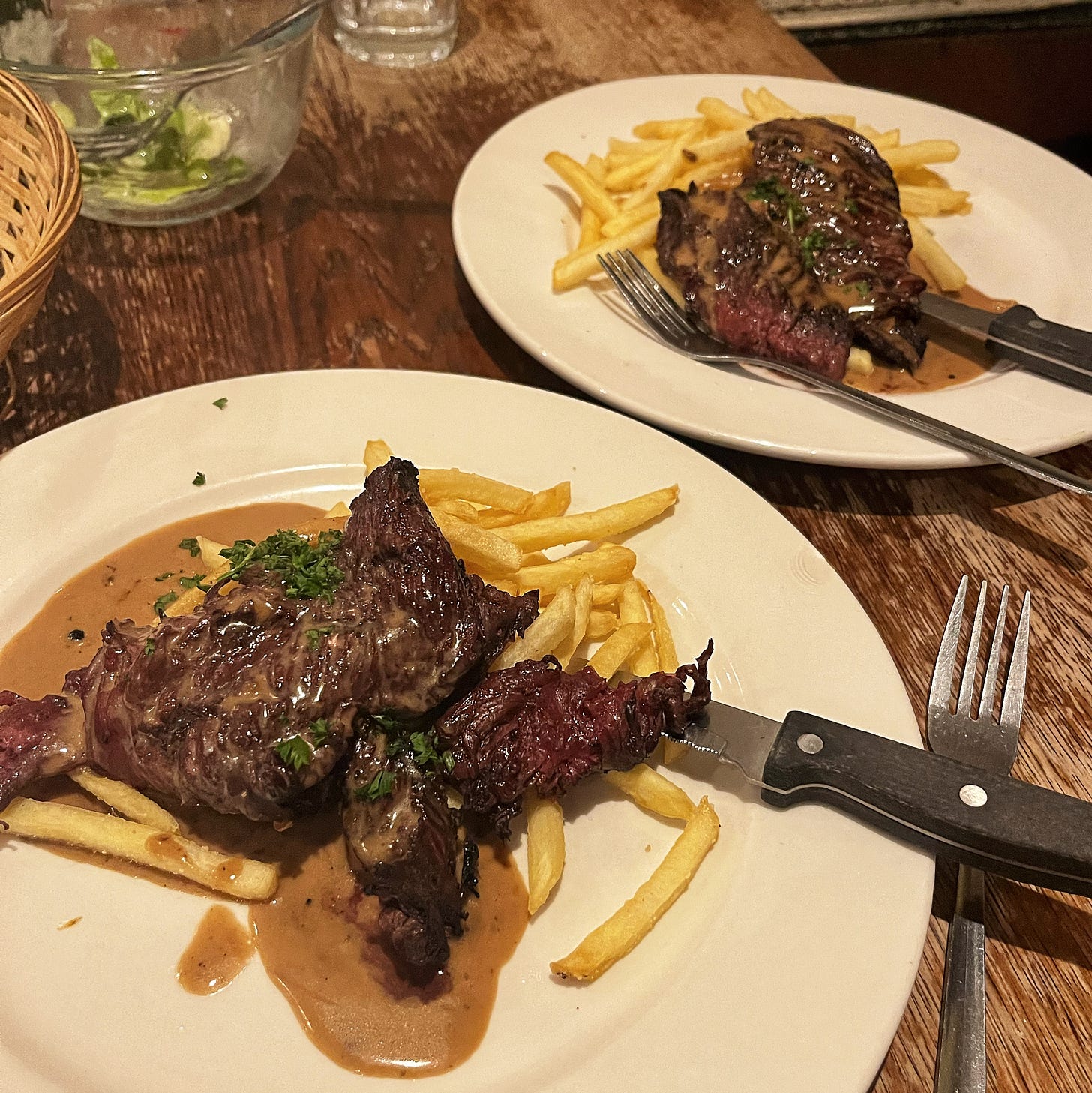 Steak frites with peppercorn sauce
