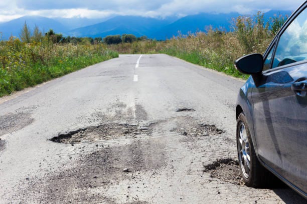 1,600+ Car Pothole Road Stock Photos, Pictures & Royalty-Free Images -  iStock