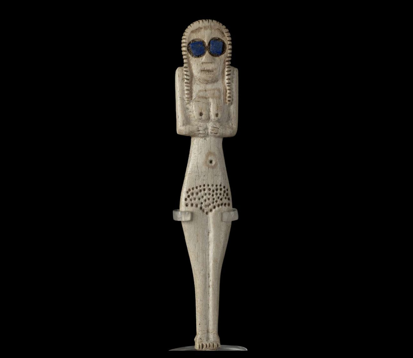 Bone Figurine of a Standing Woman with Lapis Lazuli Eyes Pre-Dynastic Egypt, Naqada I Period (c. 4000–3600 B.C.) Bone Figurine of a Standing Woman with Lapis Lazuli Eyes Pre-Dynastic Egypt, Naqada I Period (c. 4000–3600 B.C.)