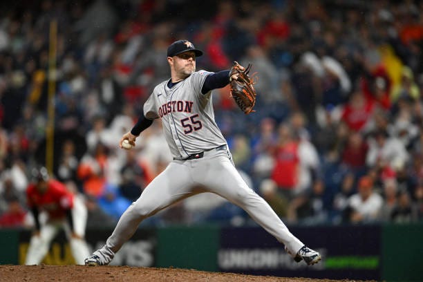 Ryan Pressly of the Houston Astros throws a pitch during the eighth inning against the Cleveland Guardians at Progressive Field on September 28, 2024...