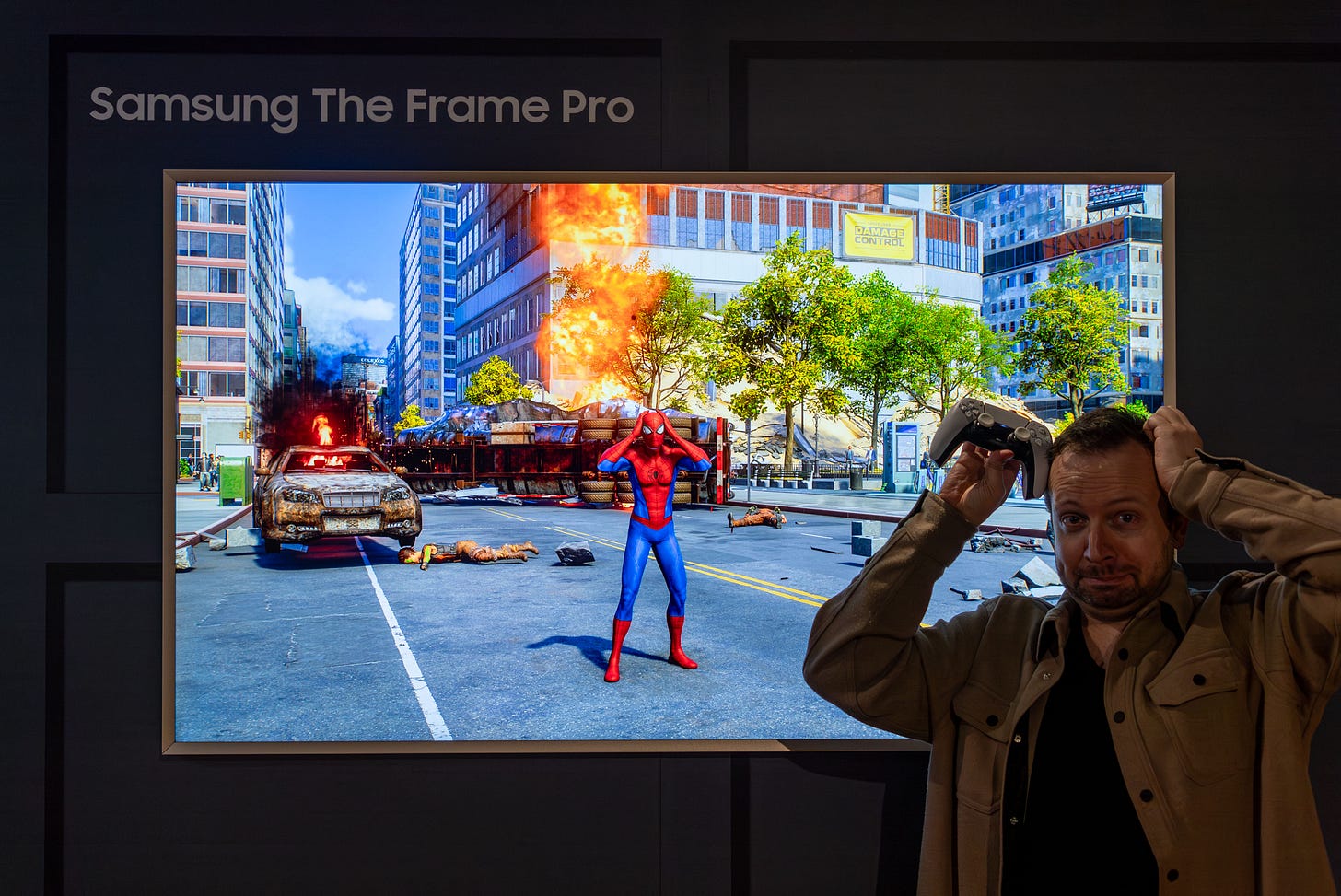 Samsung Frame Pro TV 2025 review showing Matt Swider playing Spider-Man 2 on a PS5 Pro