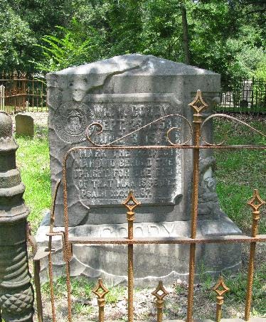 Image of a headstone at a cemetery.