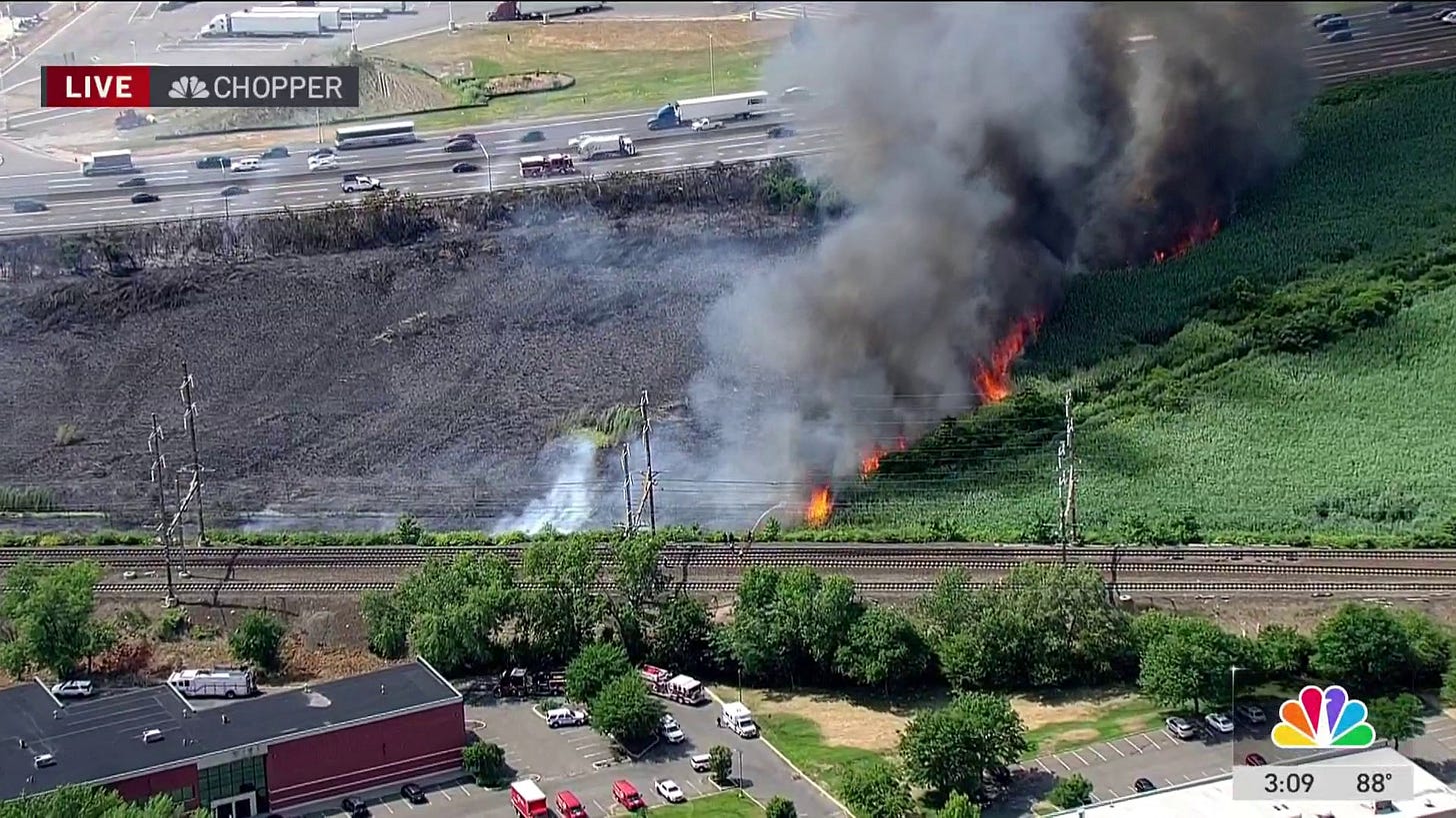 Crews battling brush fire in Secaucus near train tracks, NJ turnpike