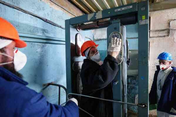 A worker passes through a radiation inspection point at the Chernobyl nuclear power plant in Ukraine on April 6, 2026. (AP Photo/Evgeniy Maloletka) A worker passes through a radiation inspection point at the Chernobyl nuclear power plant in Ukraine on April 6, 2026. (AP Photo/Evgeniy Maloletka)