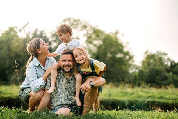 Portrait of a happy family Portrait of a happy family in the forest Family stock pictures, royalty-free photos & images