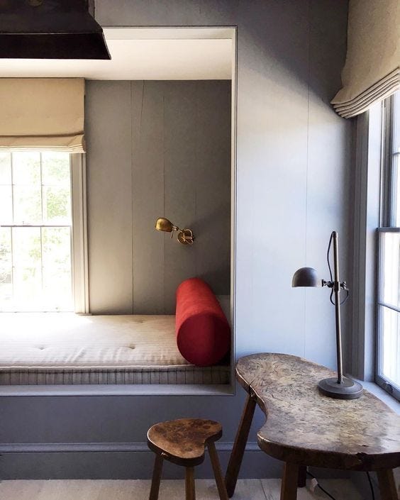 This may contain: an instagram photo of a bedroom with a bed and two stools in it