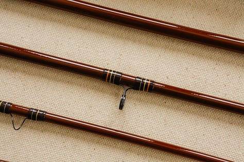 A custom 4wt fiberglass fishing rod with styling inspired by a 1970s Ford Bronco.