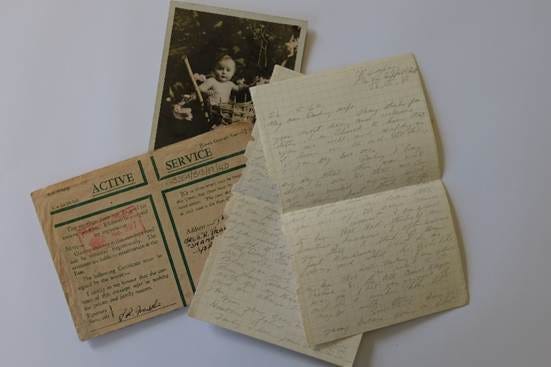 A close-up of several papers

AI-generated content may be incorrect.